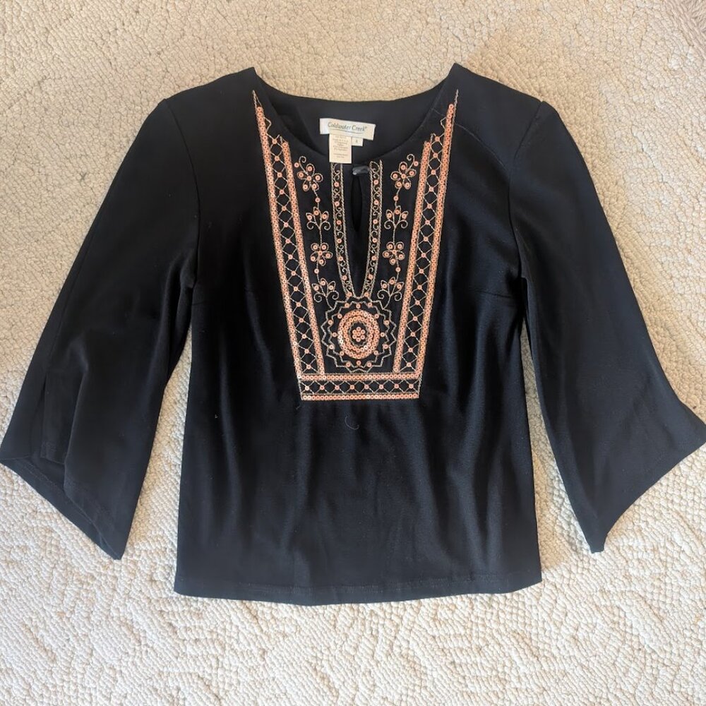 Coldwater Creek. Black flowy blouse with copper embellishment design.